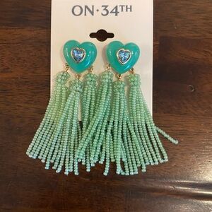 On 34th green heart dangle earrings